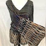 Blush Boutique long sleeve open back geometric print romper size large Photo 0