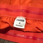 Gymshark Women's Orange Athletic Shorts Photo 6