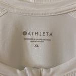Athleta  Women’s Athletic Shirt size XL color white length 28” bust 40” Photo 1