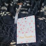 Free People  Crochet Boho Flowy Asymmetrical Cut Out Tank Top Size L Photo 5