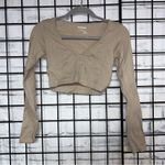 Garage  Peekaboo Cutout Keyhole Seamless Ribbed Tan Cropped Long Sleeve Top Photo 1