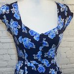 Forever 21 Floral Button Up Romper Photo 1