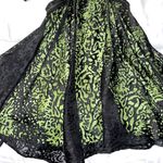 Bebe Black and lime green sheer dress with cutout sides Photo 2