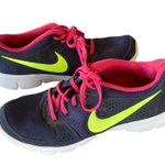 Nike athletic sneakers gray pink and yellow running tennis shoes athleisure Photo 1