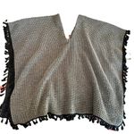 Crescent  women's size small tan pancho with black tassels Photo 1