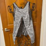 Nike 🏃‍♀️🏃‍♀️🏃‍♀️BOGOHO 🏃‍♀️🏃‍♀️🏃‍♀️ Women's Black and White Striped Tank Top Photo 3