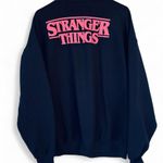 Stranger Things  Graphic Black And Pink Sweater Photo 2