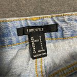 Forever 21 Ripped Jeans Light Wash, torn leg, elastic Ankle, tapered Size small Photo 5