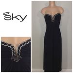 New. Sky black maxi dress with diamond cougar embellishments. XS. Retails $298 Black Photo 1