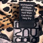 Clara Sun Woo Womens Blouse Size 1X Leopard Y2K Tunic Stretchy Knit Oversized Black Photo 4