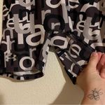 Under Armour Black and White Logo Print Spandex Workout Shorts Size Medium Photo 3