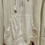 Black Market. Hoodie Jacket - unisex size large - colorful long feathered bird design. This lightweight jacket has been used and shows wear. Some piling, but no rips or stains. Pit to pit 20" Length 25" Photo 4