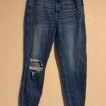 Hollister EUC Ultra High Rise Dark Wash Raw Hem Ripped Mom Jeans size 11R Photo 0