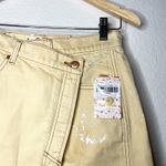Free People Parker Pale Yellow Destroyed Denim Wrap Skirt Photo 4