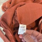EE: Size Small Rust Colored Linen Romper pit to pit is 20, waist 14 length 28 from top to bottom Orange Photo 1