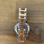 Guess women’s  watch for small wrist. It has few scratches. Photo 1