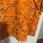 Disney Women's  Scrub Top XL Cheshire Cat Alice in Wonderland Halloween Orange Photo 2