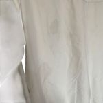 Nike The windbreaker large black light stain on back see picture Photo 3