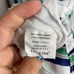 Line and Dot  Striped Peplum Sleeveless Tank Top Photo 4