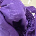 Nike Women's Athletic Shorts in Purple and White Photo 2