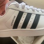 Adidas  Superstars in white and black Photo 2