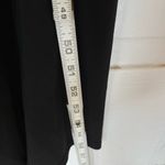 Women’s Sleeveless Black Vneck ruched dress with front slit size Large Photo 9