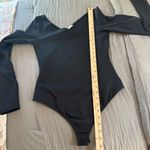 Free People  Asymmetrical Abbie Bodysuit Black. Size Medium. Photo 9