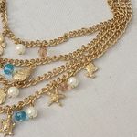 Gold 4 Strand Chain Necklace with Nautical Charms and Starfish Earrings Set Photo 4