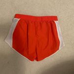 Under Armour RARE  Orange and White Athletic Shorts Photo 2
