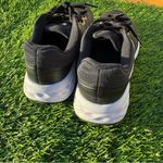 Nike  Women’s DC3729-003 Black Running Shoes Photo 2