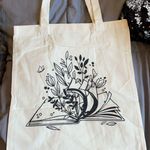 Book Themes Tan Tote Bag Photo 0