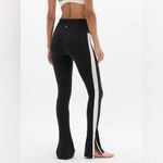 Athleta  Elation Ultra High Rise Sport Stripe Split Slim Flare black & white Photo 2