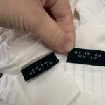 Akris  Women's White Sleeveless Asymmetric Babydoll Blouse Size 6 Photo 5