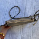 Tahari NWOT metallic gold crossbody bag. Photo 4