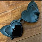 Black Heart Eyes Sunnies Black Sunglasses. gently warn and excellent condition. None smoking home. Priced to sell at as is condition or make reasonable offers. Photo 4