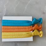Clinique NWT  Colorful Hair Tie Set - Yellow, Orange, Blue Photo 1