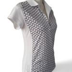 NWOT XDS by Daily Sports Women's Polo Golf Shirt. MSRP $105 White Photo 1