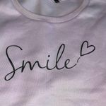 SheIn light purple smile oversized crewneck size small Photo 1