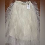 Soho Apparel  Elegant Cream High-Low Skirt Photo 1
