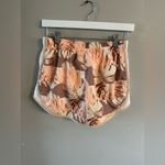 Nike Women's Athletic Shorts - Brown and Peach Floral Photo 3
