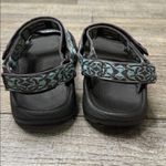 Teva  Women's Black and Teal Sandals Photo 7