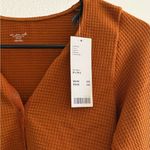 Urban Outfitters  Orange seamless Thermal Photo 2