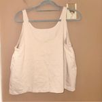 Nike Cropped Flowy Embroidered Swoosh Active Tank Tan Beige large Photo 1