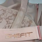SheFit  sports bra size 4luxe Photo 6