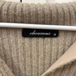 Olivaceous Women's Tan Deep V-Neck Sweater Photo 1