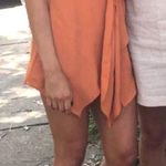 Cotton Candy LA Orange Romper Photo 0