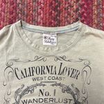 PRETTY REBELLIOUS CALIFORNIA LOVER WANDERLUST WHISKEY LABEL GRAPHIC TEE Green Photo 1