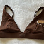 SKIMS  Swim plunge Bikini top, color COCOA, size:‎ L Photo 0