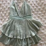 Saints + Secrets Romper Photo 1