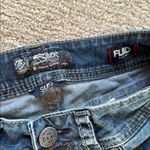 Silver Jeans Women's Blue Flared Jeans Photo 3